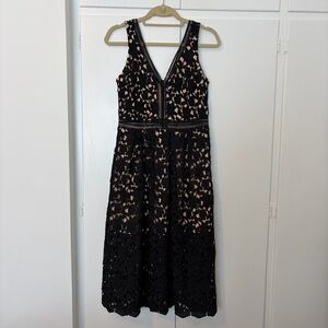 Elegant Black Peekaboo Lace V-Neck Midi Dress by Chelsea